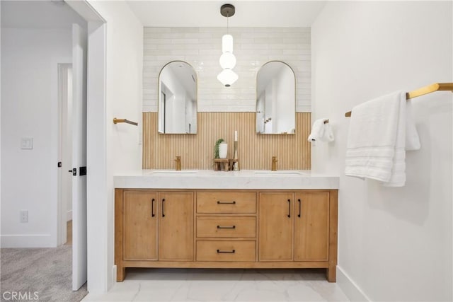 1147 Charleston St, Costa Mesa, CA 92626 - bathroom with double vanity and baseboards