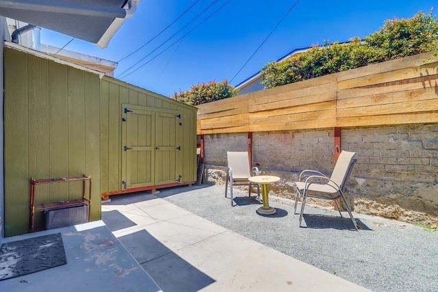 730 S 31st St, San Diego, CA 92113 - view of patio with a storage shed