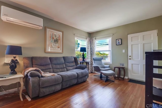 730 S 31st St, San Diego, CA 92113 - living area with an AC wall unit and wood finished floors