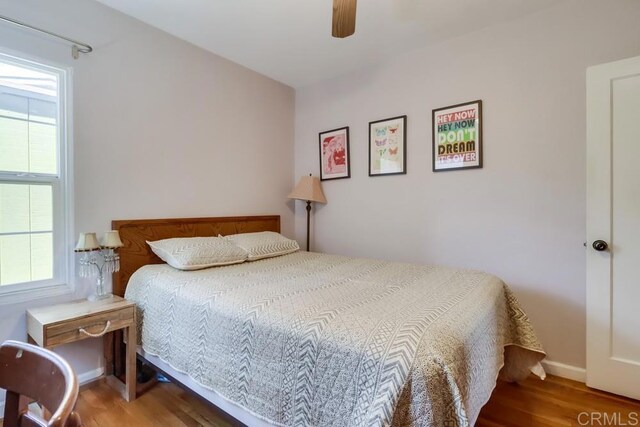 730 S 31st St, San Diego, CA 92113 - bedroom with wood finished floors and a ceiling fan