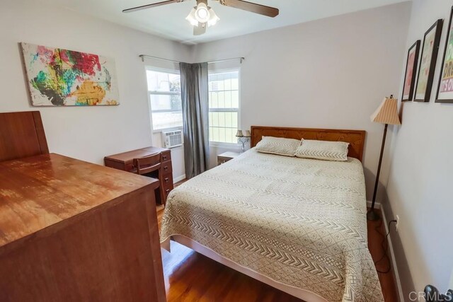 730 S 31st St, San Diego, CA 92113 - bedroom with wood finished floors, a ceiling fan, and cooling unit