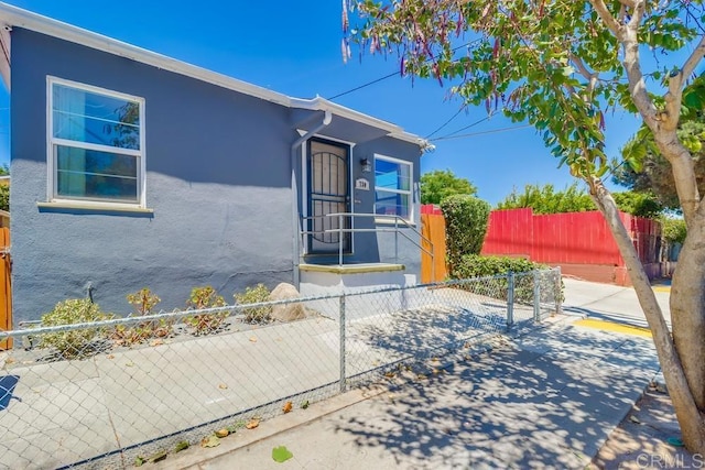 730 S 31st St, San Diego, CA 92113 - view of side of home featuring stucco siding