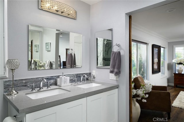 2350 Claudia St, Corona, CA 92882 - full bathroom with double vanity, wood finished floors, and ornamental molding