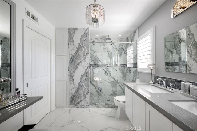 2350 Claudia St, Corona, CA 92882 - full bath featuring a marble finish shower, double vanity, marble finish flooring, and a chandelier