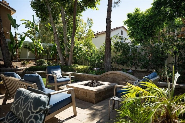 2350 Claudia St, Corona, CA 92882 - fenced backyard with a patio and an outdoor living space with a fire pit