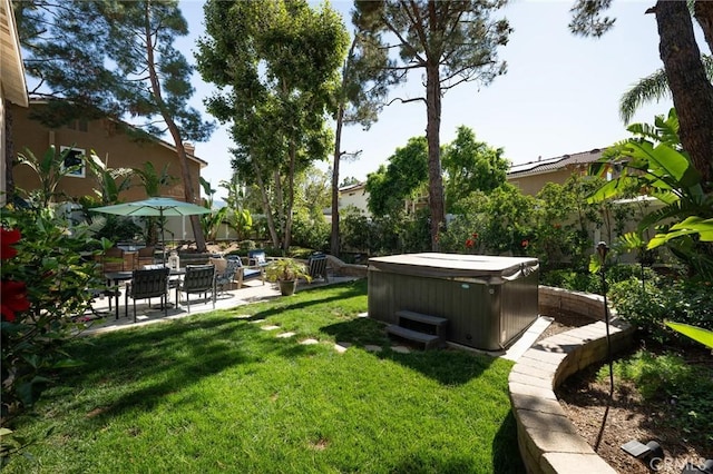 2350 Claudia St, Corona, CA 92882 - view of green lawn featuring a hot tub and a patio area