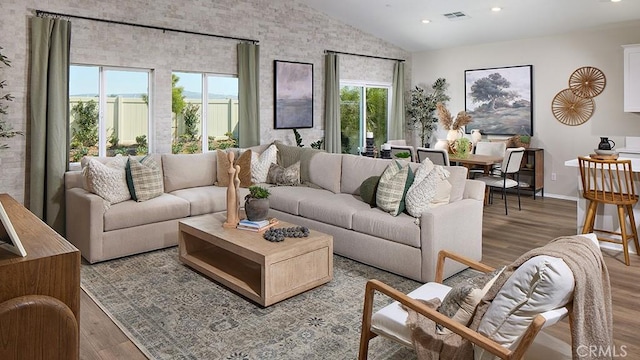 457 Wildrose Cir, San Jacinto, CA 92582 - living room featuring vaulted ceiling, wood finished floors, and recessed lighting