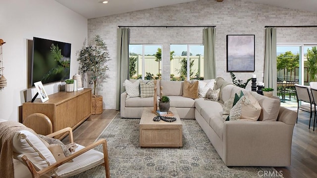 457 Wildrose Cir, San Jacinto, CA 92582 - living room featuring lofted ceiling, wood finished floors, and recessed lighting