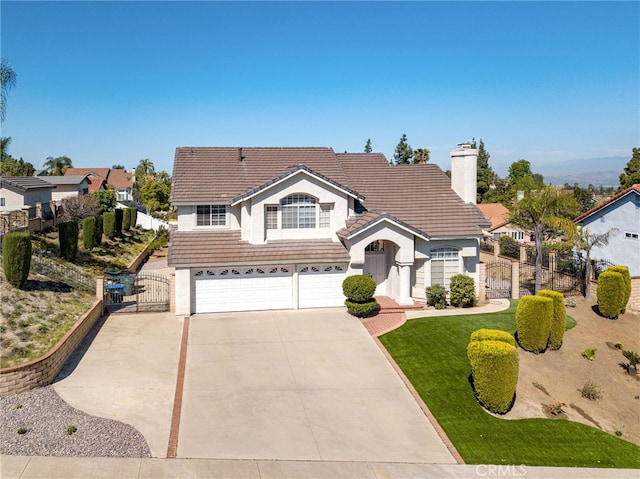 6721 Silver Oak Pl, Riverside, CA 92506 - traditional-style home with a gate, an attached garage, concrete driveway, stucco siding, and a tile roof