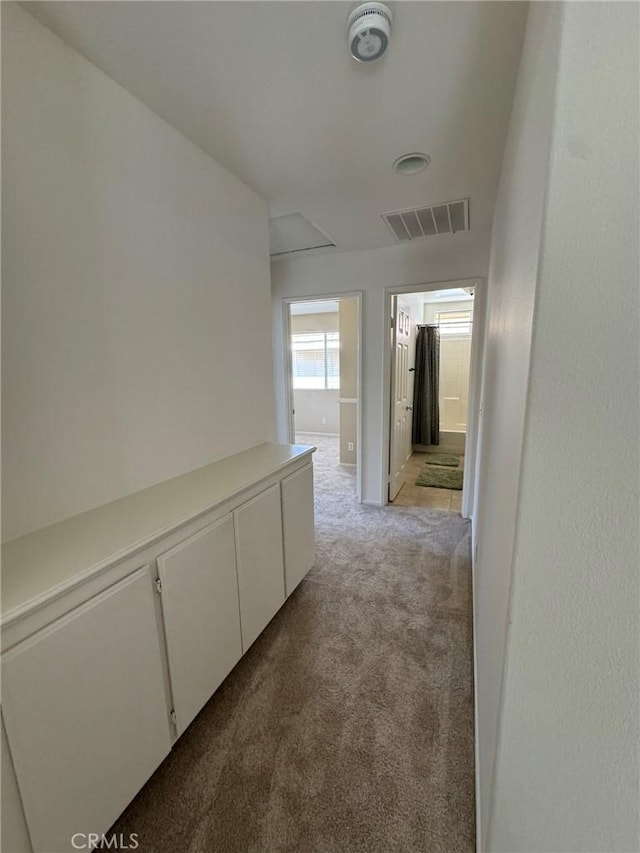 9 Greenwich Ct, Aliso Viejo, CA 92656 - hallway with light carpet