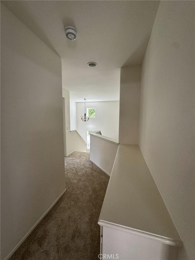 9 Greenwich Ct, Aliso Viejo, CA 92656 - hall featuring carpet flooring and a chandelier