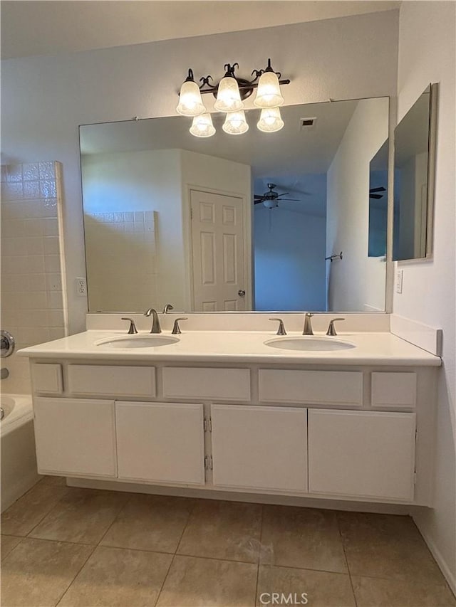 9 Greenwich Ct, Aliso Viejo, CA 92656 - full bath featuring a tub to relax in, double vanity, and tile patterned floors