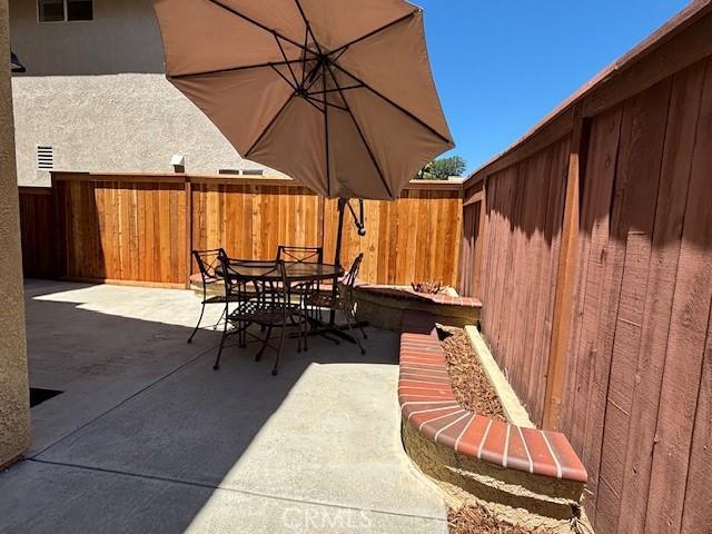 9 Greenwich Ct, Aliso Viejo, CA 92656 - fenced backyard with a patio area and outdoor dining space