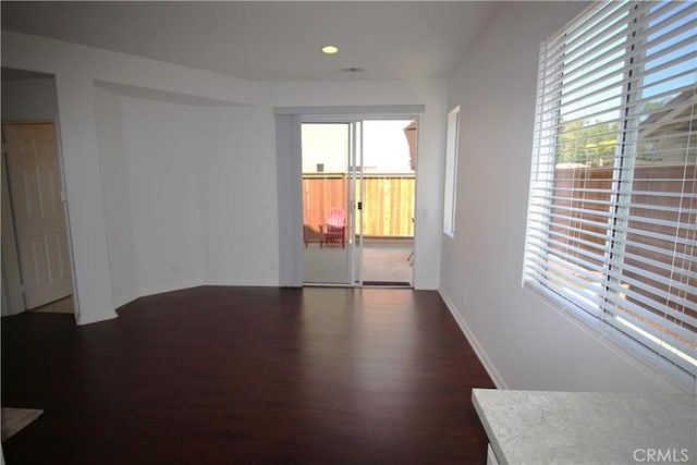 9 Greenwich Ct, Aliso Viejo, CA 92656 - spare room with wood finished floors, plenty of natural light, and recessed lighting