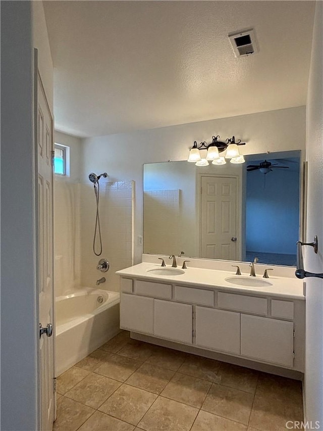 9 Greenwich Ct, Aliso Viejo, CA 92656 - full bathroom featuring double vanity, tile patterned flooring, washtub / shower combination, and a ceiling fan