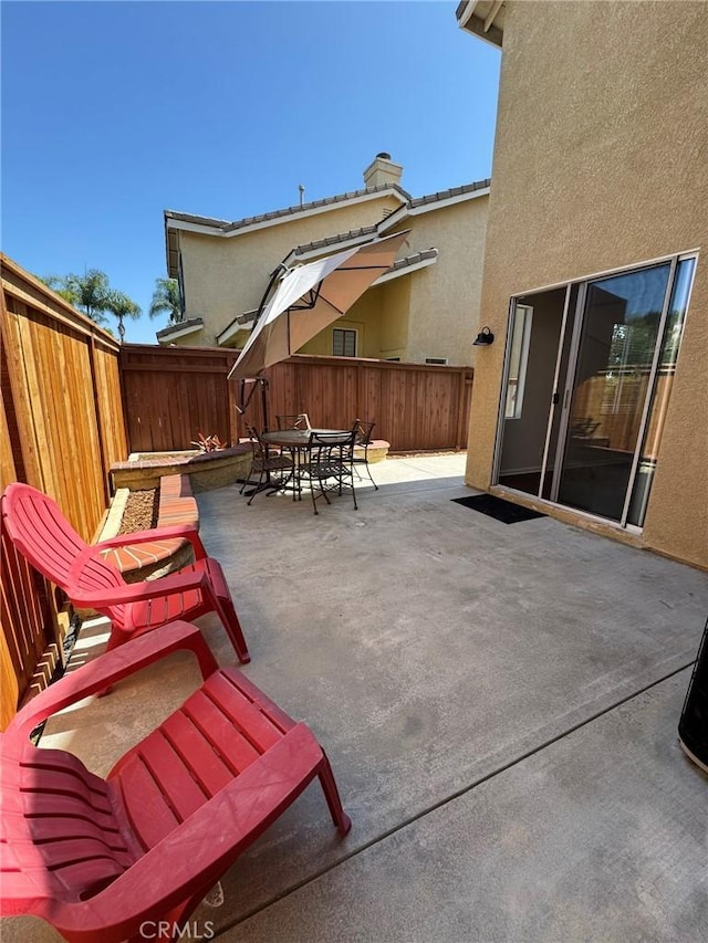 9 Greenwich Ct, Aliso Viejo, CA 92656 - fenced backyard with outdoor dining space and a patio