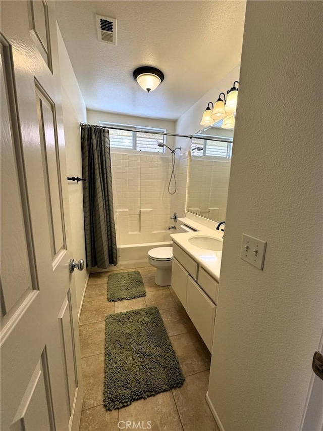 9 Greenwich Ct, Aliso Viejo, CA 92656 - bathroom with shower / bath combo, vanity, tile patterned floors, and a textured wall
