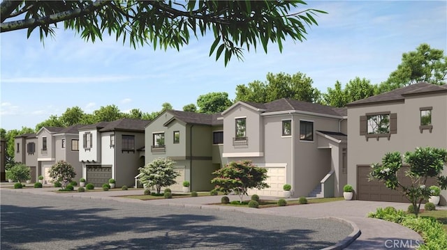 183 Park Cir, Gridley, CA 95948 - view of front of property with stucco siding, an attached garage, and a residential view
