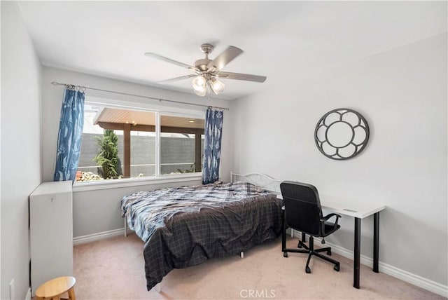 1322 W 6th St, Ontario, CA 91762 - carpeted bedroom with baseboards and a ceiling fan