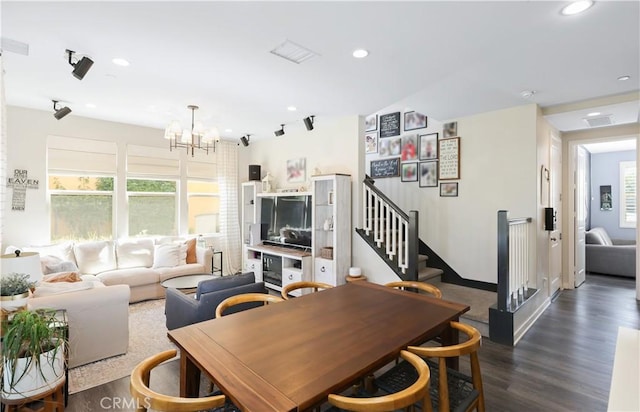 55 Fuchsia, Lake Forest, CA 92630 - living room featuring wood finished floors, a chandelier, healthy amount of natural light, stairs, and recessed lighting