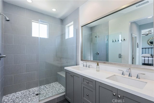 55 Fuchsia, Lake Forest, CA 92630 - full bathroom featuring a tile shower, double vanity, and recessed lighting