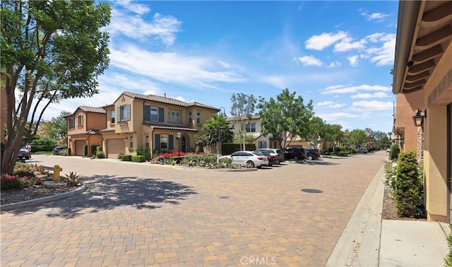 55 Fuchsia, Lake Forest, CA 92630 - view of decorative road featuring curbs and a residential view