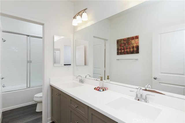 55 Fuchsia, Lake Forest, CA 92630 - bathroom with double vanity, wood finished floors, and combined bath / shower with glass door