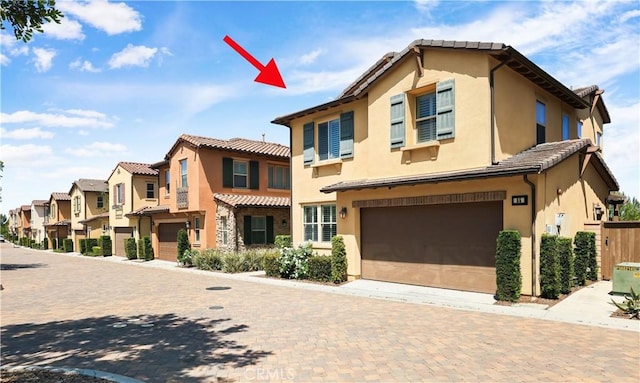 55 Fuchsia, Lake Forest, CA 92630 - multi unit property with a garage, stucco siding, a tile roof, a residential view, and decorative driveway