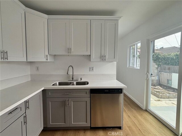 14714 S Denver Ave, Gardena, CA 90248 - kitchen featuring dishwasher, gray cabinetry, light wood-style floors, and light countertops