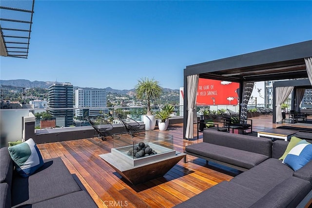 6250 Hollywood Blvd Unit 4D, Los Angeles, CA 90028 - wooden terrace featuring a mountain view, an outdoor living space, and a city view