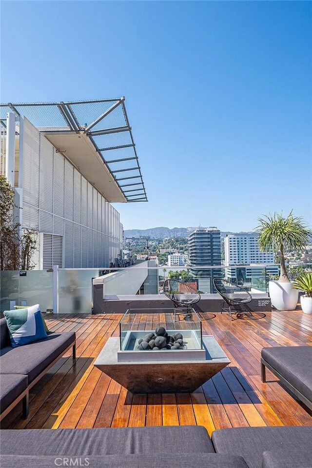 6250 Hollywood Blvd Unit 4D, Los Angeles, CA 90028 - wooden deck with a fire pit and a view of city