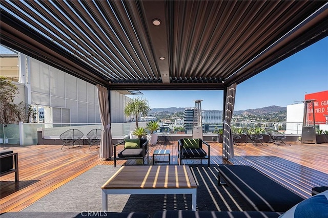 6250 Hollywood Blvd Unit 4D, Los Angeles, CA 90028 - wooden terrace with a mountain view and an outdoor living space