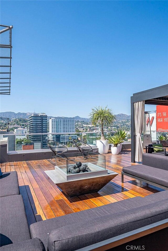 6250 Hollywood Blvd Unit 4D, Los Angeles, CA 90028 - wooden terrace featuring a mountain view and a city view