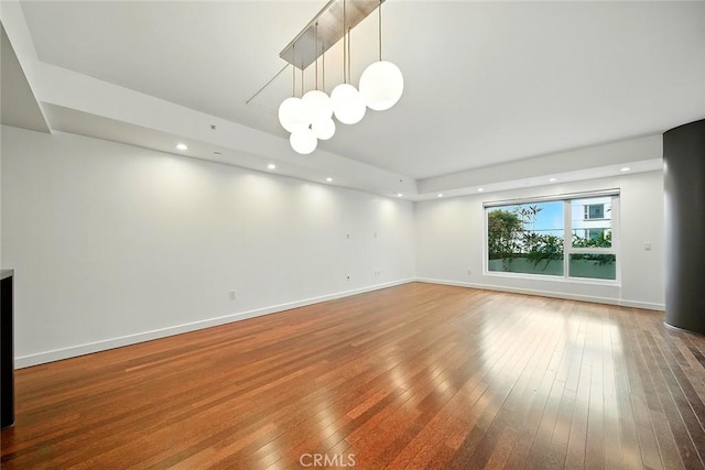 6250 Hollywood Blvd Unit 4D, Los Angeles, CA 90028 - empty room with hardwood / wood-style floors, a chandelier, and recessed lighting