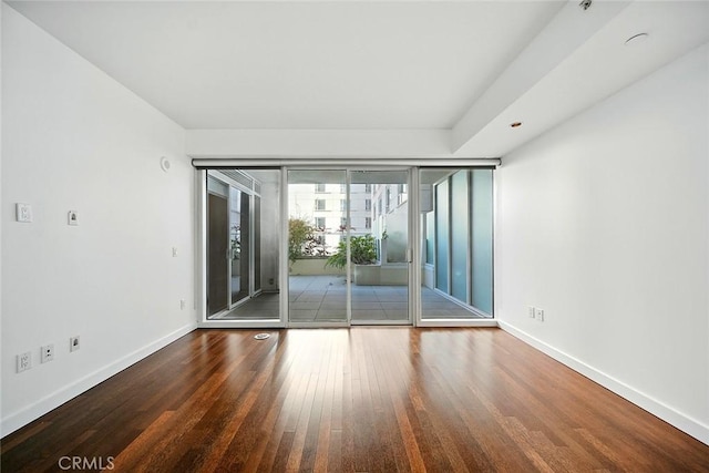 6250 Hollywood Blvd Unit 4D, Los Angeles, CA 90028 - unfurnished room with wood finished floors and baseboards