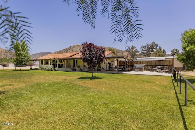30370 Bouquet Canyon Rd, Santa Clarita, CA 91390 - back of property featuring a mountain view and a patio area