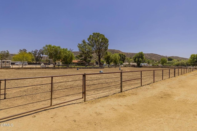 30370 Bouquet Canyon Rd, Santa Clarita, CA 91390 - view of yard with an outdoor riding arena, a mountain view, and a rural view