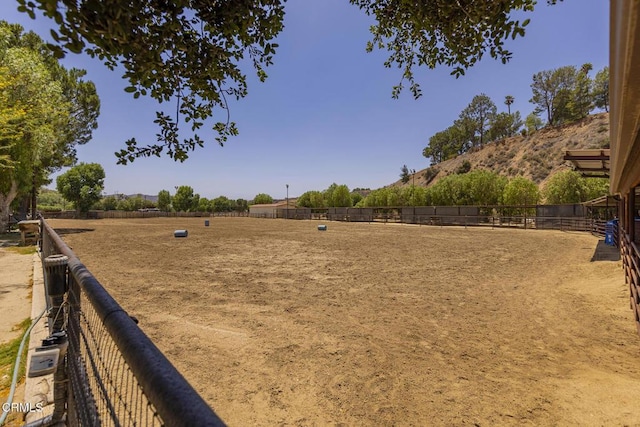 30370 Bouquet Canyon Rd, Santa Clarita, CA 91390 - view of yard featuring an enclosed riding area and a view of countryside