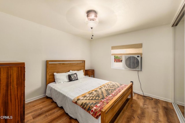 30370 Bouquet Canyon Rd, Santa Clarita, CA 91390 - bedroom with wood finished floors, a ceiling fan, and cooling unit
