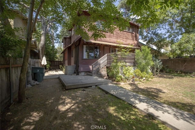 1010 N Madison Ave, Pasadena, CA 91104 - view of home's exterior with a fenced backyard and a wooden deck