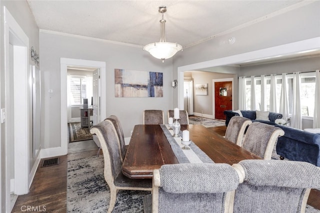 1010 N Madison Ave, Pasadena, CA 91104 - dining area featuring dark wood-style floors and crown molding