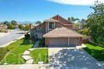 2430 Spring Meadow Dr, Chino Hills, CA 91709 - view of front of property with driveway and a garage