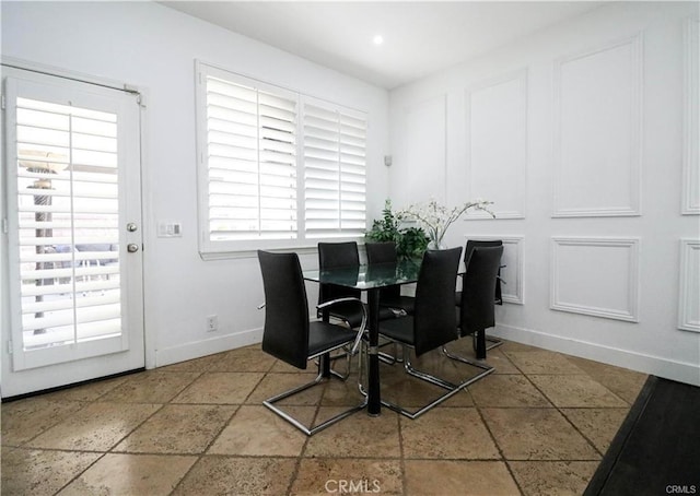 2430 Spring Meadow Dr, Chino Hills, CA 91709 - dining room with healthy amount of natural light and stone tile flooring
