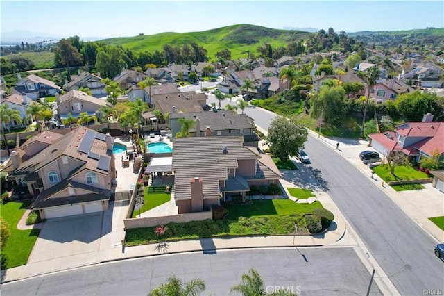 2430 Spring Meadow Dr, Chino Hills, CA 91709 - aerial perspective of suburban area featuring a pool area and a mountainous background