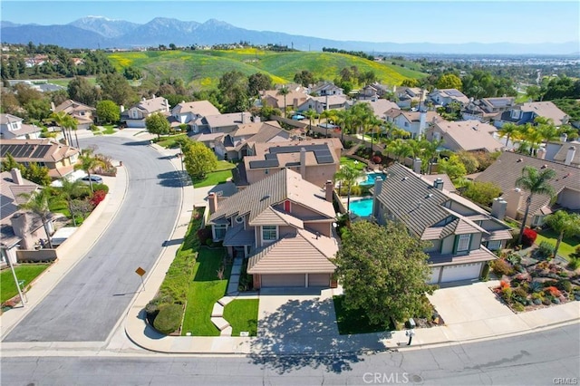 2430 Spring Meadow Dr, Chino Hills, CA 91709 - aerial perspective of suburban area featuring a mountain backdrop