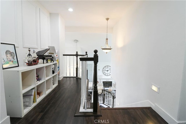 2430 Spring Meadow Dr, Chino Hills, CA 91709 - hallway with an upstairs landing and dark wood-style floors