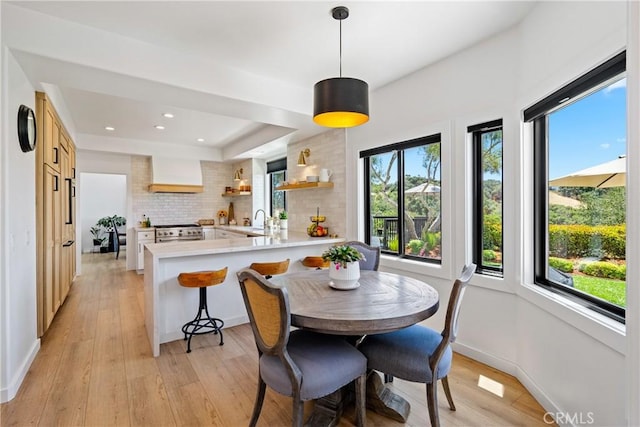 433 Emerald Bay Dr, Arroyo Grande, CA 93420 - dining room with light wood-style flooring, recessed lighting, and a raised ceiling