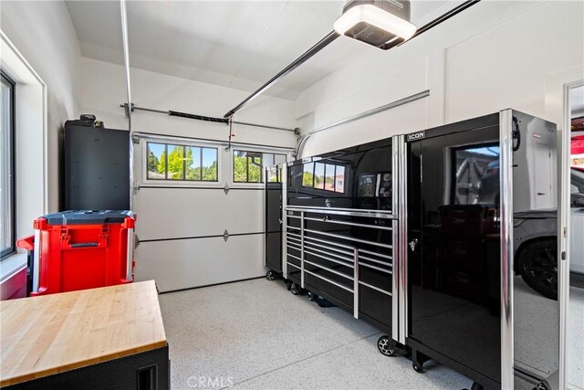 433 Emerald Bay Dr, Arroyo Grande, CA 93420 - garage featuring a garage door opener