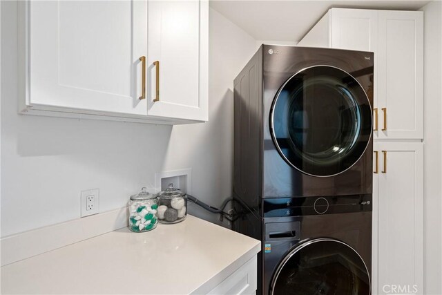 433 Emerald Bay Dr, Arroyo Grande, CA 93420 - washroom with estacked washer and dryer and cabinet space