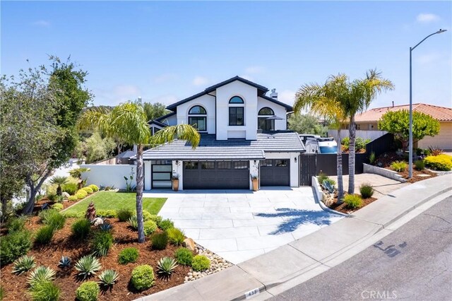 433 Emerald Bay Dr, Arroyo Grande, CA 93420 - traditional home featuring an attached garage, concrete driveway, and stucco siding